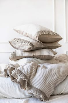 four pillows stacked on top of each other