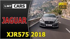 a car driving down the road with mountains in the background and text that reads jaguar xr355 2018