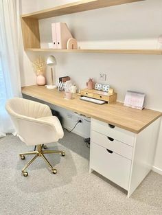 a white chair sitting in front of a desk with drawers and shelves on top of it