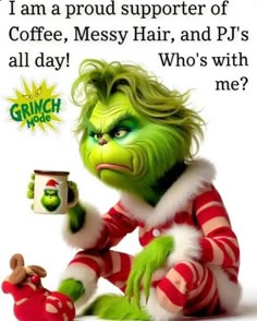 the grinch is holding a coffee cup