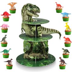 three tiered cupcake stand with dinosaurs on it