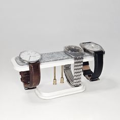 "Watch stand for desk made with birch wood. It accomodates your watches easily and displays them in a stylish way. It accomodates 4 watches at once. MATERIAL Birch plywood, steel, brass, felt VARIATIONS Walnut is water based varnished. Oak is teak oiled. Colors are water based varnished on acrylic paint. It comes with 4 variations * oak (light wood) * walnut (dark wood) * white * black DIMENSIONS *Depth: 4.8cm / 1,9\" *Width: 18cm / 7\" *Height: 8cm / 3,1\"" Watch Stand, Watch Holder, Teak Oil, Watch Display, White Watch, Jewellery Storage, Light Wood, Light Oak, Jewellery Boxes