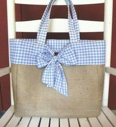 a bag sitting on top of a wooden chair