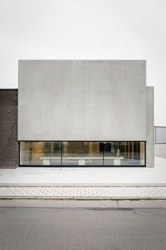 an empty building that is sitting on the street