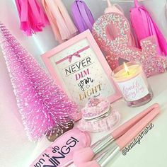 pink and purple items are displayed on a white surface with the words never dim, don't light