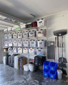 the storage room has many bins and other items on shelves, along with various cleaning supplies