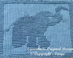 a blue knitted afghan with elephants on it