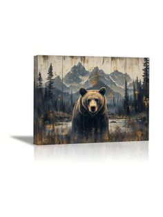 a brown bear standing in front of mountains with trees and water on it's sides