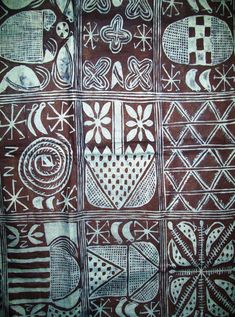 an old cloth with many different designs on it