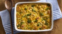 a casserole dish with broccoli and chicken in it