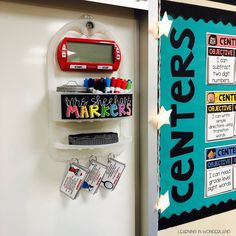 a bulletin board with magnets and writing on it