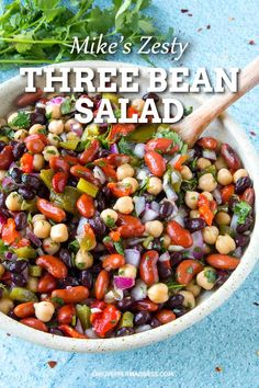 a white bowl filled with beans and vegetables