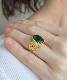 Gold Emerald Edwardian Silver Heart Ring, 925 Sterling Silver Green Quartz Gemstone Artisan Handmade Filigree Boho Women Statement Ring Dainty cocktail ring, boho wedding gift, victorian jewelry, gift ring for her, September birthstone, oval statement ring, ancient Egypt ring, birthday gift her, vintage gold ring, trendy women ring Material: 925 Sterling Silver with 18K Gold plated ( NICKEL FREE ) Gemstone: Emerald 10x14 mm. FREE, FAST AND TRACKABLE SHIPPING FOR ALL EU COUNTRIES AND USA. Elevate your elegance with the epitome of luxury - the Gold color Emerald Edwardian Silver Heart Ring. Crafted with precision and passion, this exquisite piece of jewelry is a testament to artisan craftsmanship and timeless beauty. Made from the finest 925 sterling silver, it showcases a resplendent green 22 Karat Gold Rings, Oval Gemstone Heart Ring As Gift, Oval Gemstone Heart Ring For Gifts, Filigree Ring For May Birthstone Gift, May Birthstone Filigree Ring Gift, Emerald Filigree Ring Gift, Emerald Ring With Filigree For Gift, Intricate Emerald Ring For Gift, Emerald Ring With Intricate Design Gift