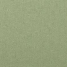 an image of a plain green fabric textured with some sort of cloth on it