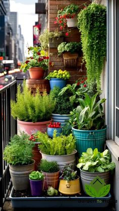 A vibrant urban balcony garden filled with various containers and pots of different sizes and colors. The containers are bursting with a diverse array of plants including herbs, leafy greens, flowering plants, and trailing vines. City skyline visible in the background, showcasing the contrast between the lush greenery and urban setting. Gardens For Small Spaces, Efficient Gardening, Rooftop Garden Urban, Vegetable Garden Design Ideas, Recycled Containers, Butterfly Garden Plants, Keyhole Garden, Lasagna Gardening, Window Box Garden