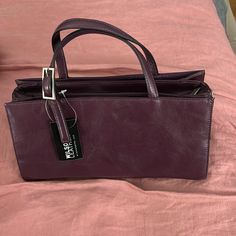 New With Tag Wilsons Leather Pelle Studio Roma Handbag. Includes Detachable Shoulder Strap Purple Leather Satchel, Purple Leather Satchel For Formal Occasions, Soft Leather Purple Shoulder Bag, Modern Purple Leather Satchel, Purple Soft Leather Shoulder Bag, Modern Purple Leather Shoulder Bag, Elegant Purple Bag With Zipper Closure, Elegant Purple Bags With Zipper Closure, Elegant Purple Shoulder Bag With Zipper