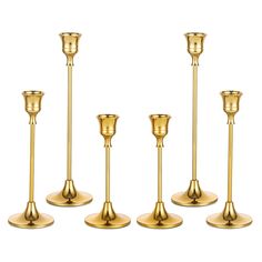 PRICES MAY VARY. SLEEK & SHINY: sophisticated surface treated, this brass candlestick holder set is sleek, shiny, will be an eye-catching decorative piece on your table or fireplace mantle or shelf FUN & ELEGANT CANDLE HOLDER: exquisite candle stick long holder, stemmed and vintage design, looks elegant and fits various occasions, like daily home interior decoration, parties, Halloween decor, home festive dinning table decorations EASY TO GO WITH various home interior: vintage candle holder but Gold Candle Stick With Tapered Candle, Gold Candles Holder, Brass Cabdlesticks, Gold Candle Sticks On Mantle, Wedding Decorations Gold, Gold Candle Stick Holders, Gold Taper Candle Holders, Gold Taper Candles, Gold Candlestick Holders