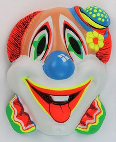 a colorful clown mask on a white background