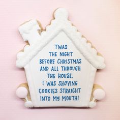 a gingerbread house decorated with frosting and icing saying it was the night before christmas and all through the house i was showing cookies straight into my mouth