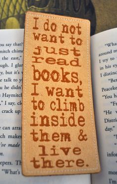 a bookmark with the words i do not want to just read books, i can't inside them