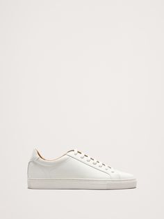 We can't get enough of these sneakers (and neither can you).  There's lots to love: leather uppers, sleek design, and lightweight OrthoLite® performance insoles—which wick away moisture for comfort.  Leather uppers.  Rubber soles.  B width. Minimalist Silhouette, Wicks, Sneakers White, Leather Sneakers, Banana Republic, Leather Upper, Personal Style, Women Shoes, Sneakers