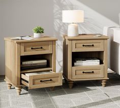 two nightstands side by side with books and magazines on them in a living room