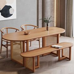 a wooden table with four chairs and a bench in front of a painting on the wall