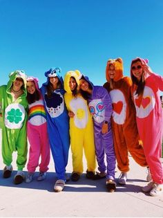 group of people in costumes posing for the camera