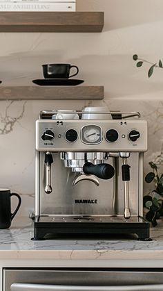 an espresso machine sitting on top of a counter