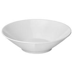 an empty white bowl on a white background