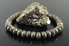 You will Absolutely LOVE this PYRITE Bracelet ! Also Includes POWERFUL Pyrite Affirmations for Wealth, Success & Abundance Wearing PYRITE every day can protect you and your loved ones from evil spirits and provide health and fortune to you and your family. Get some pyrite as quickly as you can if it speaks to you. ABUNDANCE is a Vibration ... Get tuned to that Vibration and everything you desire will FLOW to you.  This Unique High Quality Pyrite 8mm or 6mm Healing Crystal Bracelet makes a gift t Pyrite Affirmations, Abundance Bracelet, Affirmations For Wealth, Pyrite Bracelet, Wealth Abundance, Pyrite Crystal, Crystal Healing Bracelets, Bracelet Men, Bracelet Gemstone