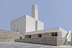 an empty parking lot in front of a church