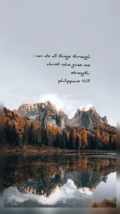 an image of mountains and water with a bible verse written in the middle on it