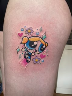 a woman's thigh with a cartoon character on it