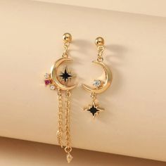 This Lovely Boho Pair Of Mismatched Celestial Crescent Moon And Eight Point Star Dangle Earrings Is A Wonderful Addition To Your Wardrobe And Your Style! This Unique Pair Is Sure To Get Lots Of Compliments! Dangling Star Earrings, Eight Point Star, Star Dangle Earrings, Reality Shifting, Boho Drop Earrings, Earthy Style, Moon And Star Earrings, Moon Studs, Ankle Chain