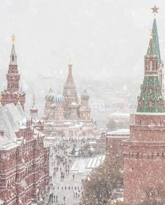 an image of a snowy cityscape that looks like it is in the middle of winter