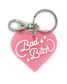 This kitschy heart-shaped design has sassy feminine attitude. Am I a bitch? A bad one, baby. Heart keychain Acrylic base w/ recessed design Translucent w/ sparkles! Key ring w/ lobster claw clasp Measurements: 2.25" x 2" w/out attachment By A Shop Of Things Acrylic Keychain Design Ideas, Baddie Keychain, Feminine Attitude, Coraline Film, Chain Ideas, Keychain Acrylic, Baby Heart, Keychain Design, Heart Keychain