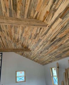 a room that has some wood on the ceiling