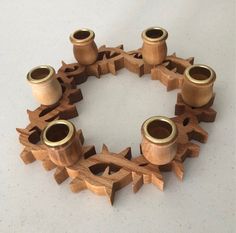 several wooden spools are arranged in a circle