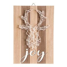 a wooden sign that says joy with a deer's head made out of string