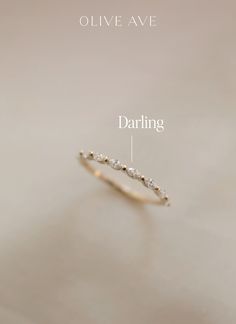 an image of a ring with the name daring written on it and labeled in white gold