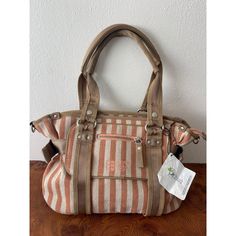 Unique And Vintage George Gina & Lucy Handbag In Like New Condition. Beautiful Peach And Off White Stripes Cotton Purse With Beige Or Tan Canvas Straps And Edge. Silver Metal Accents And Zippers. Front Pocket With Zipper. Inner Pocket With Zipper And Two Open Pockets On The Other Side. Two Adjustable Side Canvas Straps. Nwt Original Price $173.00. This Bag Is Missing A Shoulder Strap And The Key Chain Which Is Reflected In The Price. Approximate Measurements: 10" Tall 17" Wide 6.5" Deep Vintage Canvas Hobo Tote Bag, Vintage Canvas Shoulder Bag For Summer, Vintage Pink Shoulder Bag For Everyday, Vintage Pink Shoulder Bag With Adjustable Strap, Vintage Beige Hobo Bag With Removable Pouch, Vintage Beige Hobo Bag, Vintage Beige Canvas Bag For Everyday, Vintage Beige Canvas Bag, Vintage Beige Bag With Removable Pouch