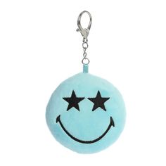 a blue smiley face keychain with three stars on the front and one star on the back