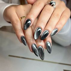 Click to see more.

50 Stunning Cat Eye Nail Designs to Captivate Any Crowd Black Nail Short Simple, Black Nails Cateye, Black Eye Nails, Black Cat Eye Almond Nails, Nails Dark Colors Designs, Kat Eyes Nails, Black Cat Eyes Nail, Black Nails With Cat Eye, Short Black Cat Eye Nails