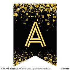 a black and gold banner with the letter a on it's side, surrounded by confetti