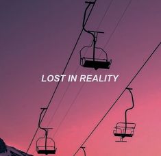 a ski lift with the words lost in reality above it and an image of a mountain