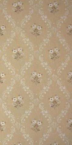 an old fashioned wallpaper with white flowers on it