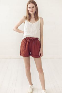 "DETAILS * Linen shorts with two side pockets * With elastic band around and wee belt to tie it up * Cute and Elegant, suit for summer days * Made from soft wash medium weight (185 gsm) 100 % European linen fabric * Height of the model is 177 cm (5' 8\") and she is wearing shorts in size XS/S and burnt orange color * The full shorts length is 40 cm (15.7\") * Please choose another color and size on the right * Product number: SH02 CARE LABEL * machine wash gentle (40 C/104 F) * dry gentle on low Summer Drawstring Short Pants, Summer Short Pants With Drawstring, Summer Bottoms With Tie Waist, Summer Style Short Bottoms With Tie Waist, Summer Shorts With Tie Waist, Linen Shorts Outfit, Suit For Summer, Elegant Suit, Shorts Linen