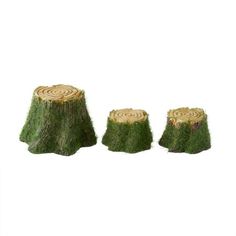 three pieces of grass sitting on top of each other