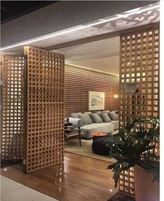 Interior Pivot Door, Modern Partition Walls, Room Partition Wall, Painted Living Room Furniture, Living Room Divider, Diy Room Divider, Separating Rooms, Wooden Screen, Living Room Partition